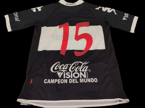 Camisa Olimpia Away 2011/12 – costas #15 Adrián Romero