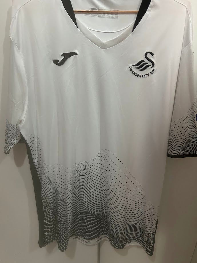 CAMISA SWANSEA CITY - HOME (TITULAR) - 2020/2021 - JOMA