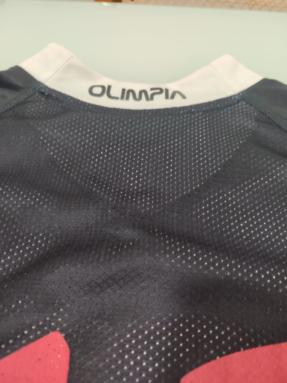 Camisa Olimpia Away 2011/12 – inscrição Olimpia na nuca