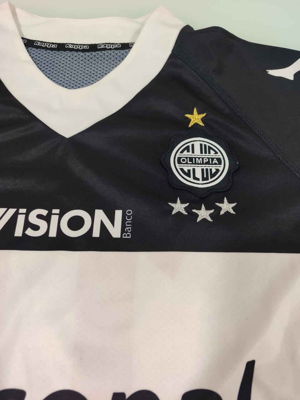 Camisa Olimpia Away 2011/12 – detalhe do peito