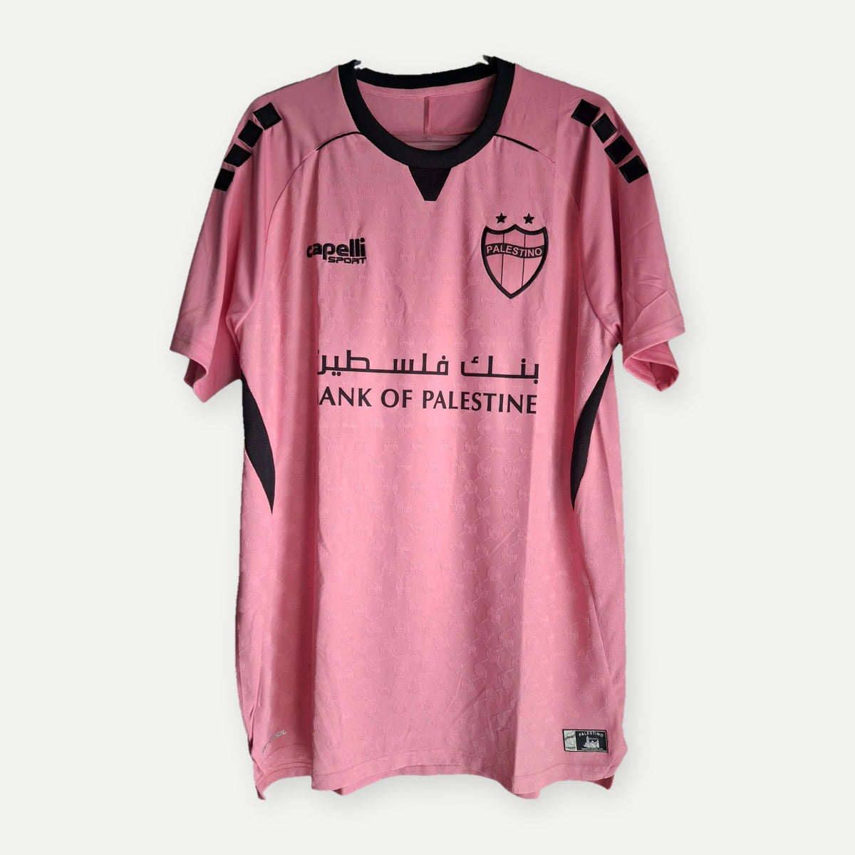 Camisa Palestino Rosada 2026 Capelli – frente Bank of Palestine